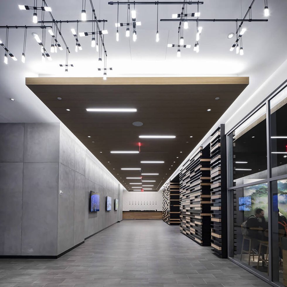 Hallway with a dramatic lighting fixture on the ceiling